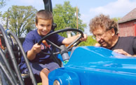 Boy on tractor